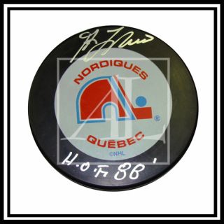 Puck of Guy Lafleur of the Quebec Nordiques with HOF inscription