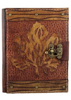Leaf on A Brown Leather Bound Journal Notebook Diary Sketchbook