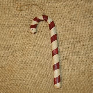cane measure 9 inches long . There is a string on top to hang it