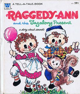 raggedy ann and the tagalong present with story by marjory schwalje