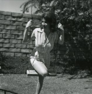 Photo Charming Brunette Pin Up Girl Judy McCutcheon on Swing