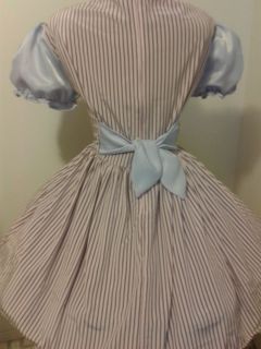 this candystripe dress is made of pink brown striped shiny poly fabric