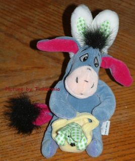 RETIRED 2003 EASTER EEYORE WITH A GINGHAM BUNNY IN HIS EASTER BASKET