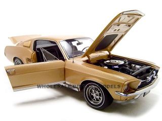 Brand new 118 scale diecast model of 1967 Ford Mustang GT390 Gold die