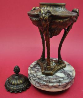 figural mantel clock and sidebars   marble and cast iron   arround
