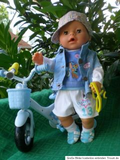 Zapf Baby Born Puppe 43 cm Junge magische Augen + Fahrrad + viel