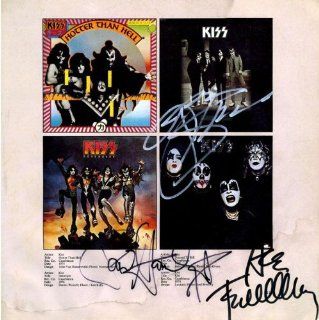 Autographed KISS 12x12 book page Collectibles